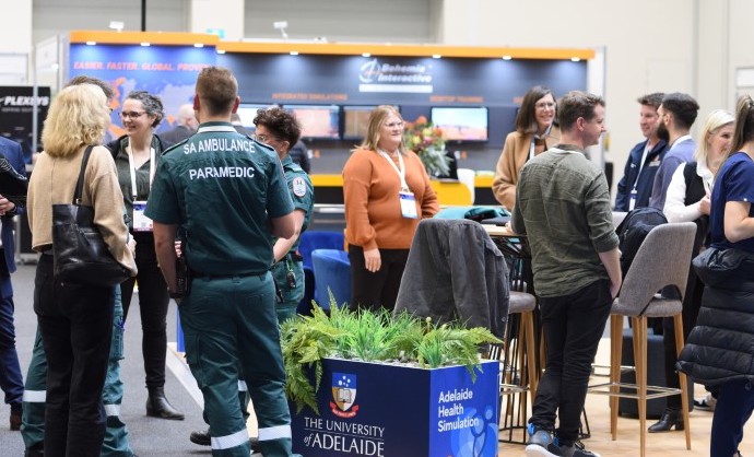 Attendees at the 2023 ASC talk with each other